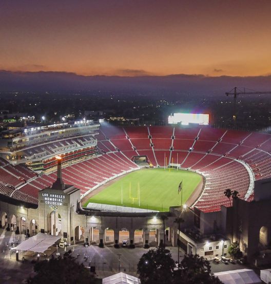 stadium with lights and sunset